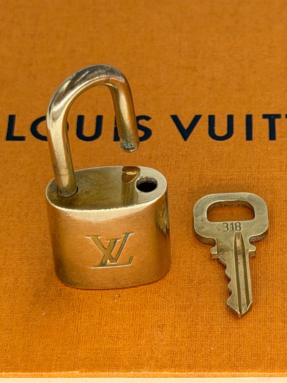 Authentic Louis Vuitton Gold-Tone LV Lock and Key Set - Picture 2 of 8